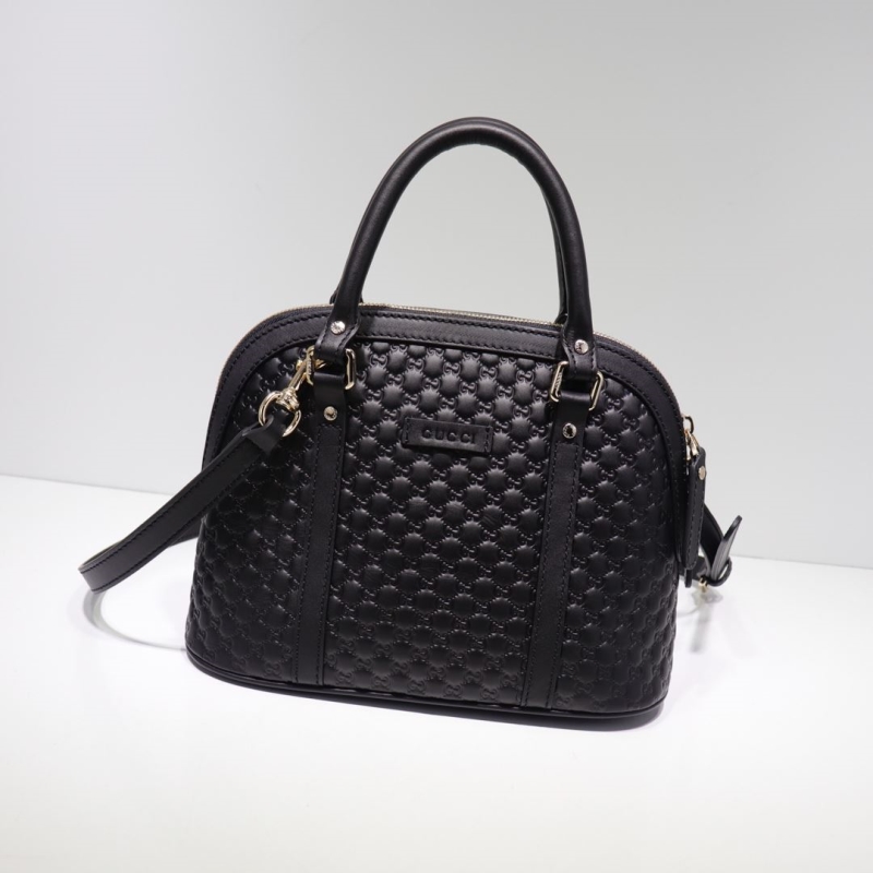 G*u*i top handle bags